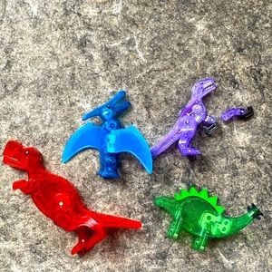 Four Magnatiles dinousars